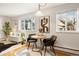 Cozy dining area with a round table and two black chairs at 1419 Detroit St # 25, Denver, CO 80206