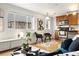 Modern kitchen with stainless steel appliances and wood cabinets at 1419 Detroit St # 25, Denver, CO 80206