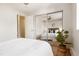 Cozy main bedroom with a mirror sliding-door closet for added storage and convenience at 1419 Detroit St # 25, Denver, CO 80206