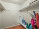Spacious walk-in closet with ample shelving for organization and storage at 1517 S Owens St # 9, Denver, CO 80232