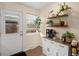 Charming eat-in kitchen with wooden floors and ample natural light at 1517 S Owens St # 9, Denver, CO 80232