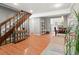 Cozy living room with hardwood floors, staircase and dining area in view at 1517 S Owens St # 9, Denver, CO 80232
