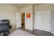 Home office with closet and view into an adjacent room at 6889 E 119Th Ave, Thornton, CO 80233