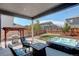 Patio area with a hot tub, outdoor grill, patio furniture, and wooden pergola at 6889 E 119Th Ave, Thornton, CO 80233
