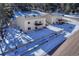 Aerial back view of two homes, both with decks and walkout basements at 93 Greeley Blvd, Palmer Lake, CO 80133