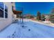 Back exterior of home featuring a walkout basement and an upper deck at 93 Greeley Blvd, Palmer Lake, CO 80133