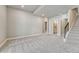 Unfinished basement offering potential with access to multiple rooms and stairs at 93 Greeley Blvd, Palmer Lake, CO 80133
