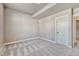 This bedroom features soft carpeting and neutral walls, creating a calm and inviting space at 93 Greeley Blvd, Palmer Lake, CO 80133