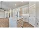 Bright kitchen with granite counters, stainless steel appliances and a center island at 93 Greeley Blvd, Palmer Lake, CO 80133