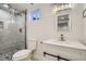 Basement bathroom with shower, toilet and vanity at 71 W Fremont Ave, Littleton, CO 80120