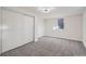 Finished basement bedroom with carpet and window at 71 W Fremont Ave, Littleton, CO 80120