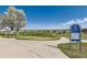 Picturesque community park with paved trails, lush greenery, and neighborhood views at 13960 Grape St, Thornton, CO 80602