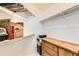 This walk-in closet features ample shelving and storage, providing organized space at 13960 Grape St, Thornton, CO 80602