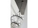 Close up shot of the modern chandelier at 2990 S Juliet Ct, Strasburg, CO 80136