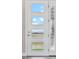 Modern front door with windows featuring countryside views at 2990 S Juliet Ct, Strasburg, CO 80136