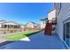 The backyard has wood stairs leading to the second story and new turf at 4783 S Wenatchee Cir, Aurora, CO 80015