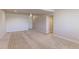 Spacious basement with neutral colors and carpet floors. Ready to be customized at 4783 S Wenatchee Cir, Aurora, CO 80015