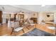 Bright and airy living area featuring hardwood floors, and an open-concept design at 16805 W 16Th Pl, Golden, CO 80401