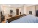 Relaxing main bedroom includes hardwood floors, closet access, and an attached fireplace at 16805 W 16Th Pl, Golden, CO 80401