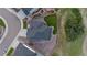 Aerial view of a well maintained home with landscaping and a unique stone driveway at 423 Rogers Way, Castle Rock, CO 80104