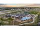 Aerial view of the community pool, clubhouse and surrounding neighborhood at 423 Rogers Way, Castle Rock, CO 80104