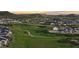 Panoramic view of the neighborhood with walking trails through a green common area at 423 Rogers Way, Castle Rock, CO 80104