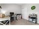 Bright bedroom with a functional desk area and comfortable carpet, great for work or relaxation at 23346 E 5Th Pl # 101, Aurora, CO 80018