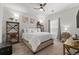 Bright and inviting bedroom with a comfortable bed, soft lighting, and stylish decor at 23346 E 5Th Pl # 101, Aurora, CO 80018