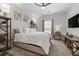 Comfortable bedroom with ample lighting and neutral tones, creating a relaxing atmosphere at 23346 E 5Th Pl # 101, Aurora, CO 80018