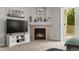 Living room features a fireplace and access to the patio at 23346 E 5Th Pl # 101, Aurora, CO 80018