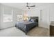 Comfortable bedroom with a queen-sized bed and natural light at 2520 Canfield Ln, Erie, CO 80026