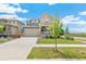 Charming two-story home featuring a well-maintained lawn and a two-car garage, perfect for suburban living at 2520 Canfield Ln, Erie, CO 80026