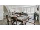 Open-concept living area combining the dining room, kitchen, and living room offering plenty of space for entertaining at 2520 Canfield Ln, Erie, CO 80026
