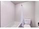Classic bathroom featuring subway tile backsplash over the tub and a modern toilet at 130 N Pearl St # 1606, Denver, CO 80203