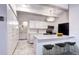 Bright kitchen with sleek quartz countertops, stainless steel appliances, and ample cabinet space, perfect for cooking at 130 N Pearl St # 1606, Denver, CO 80203