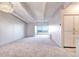 Bright open floor plan featuring pristine white walls, light floors, and large windows showcasing stunning views at 130 N Pearl St # 1606, Denver, CO 80203
