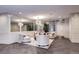 Bright lobby with herringbone floors, decorative mirrors, and comfortable seating area at 130 N Pearl St # 1606, Denver, CO 80203