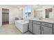 Bright bathroom features a soaking tub, double vanities, and a separate shower at 4273 Ridgewalk Pt, Castle Rock, CO 80108