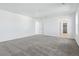 Spacious bedroom with neutral carpeting, white walls, and ample natural light at 4273 Ridgewalk Pt, Castle Rock, CO 80108