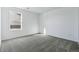 Bright bedroom with neutral carpet and a window offering great natural light at 4273 Ridgewalk Pt, Castle Rock, CO 80108