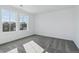Bright bedroom with carpet, natural light, and large windows for a relaxing space at 4273 Ridgewalk Pt, Castle Rock, CO 80108