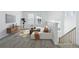 Bright and airy living room with a comfortable white sofa and contemporary decor at 4273 Ridgewalk Pt, Castle Rock, CO 80108