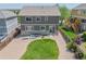 This backyard includes patio space, a grassy area, and rock landscaping that surrounds the perimeter at 7312 Grady Cir, Castle Rock, CO 80108