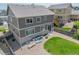 Backyard featuring a patio area with furniture and manicured landscaping at 7312 Grady Cir, Castle Rock, CO 80108