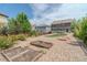 Backyard featuring gravel, garden beds, and privacy fencing at 7312 Grady Cir, Castle Rock, CO 80108