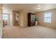 Bright bonus room with carpet, ample space, and natural light at 7312 Grady Cir, Castle Rock, CO 80108