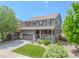Beautiful two-story home featuring a cozy front porch and an attached two-car garage at 7312 Grady Cir, Castle Rock, CO 80108