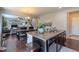 Gourmet kitchen with an island, granite countertops, dark cabinets, and stainless steel appliances at 7312 Grady Cir, Castle Rock, CO 80108