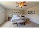 Main bedroom features neutral tones, carpeted floors, and a ceiling fan at 7312 Grady Cir, Castle Rock, CO 80108