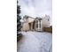 Exterior angle of home with landscaped front yard, and architectural window accents at 10510 Berthoud Way, Parker, CO 80134